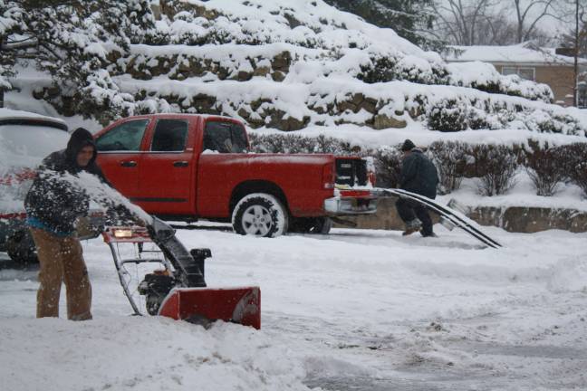 Peterson Landscapes at work in Lake Mohawk.