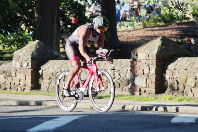Another big triathlon for Pass it Along Thirty six year old Rob Rohel of Sussex, N.J. rides during the cycling part of the triathlon. Rohel finished in 9th place overall with a time of 1:07:48.