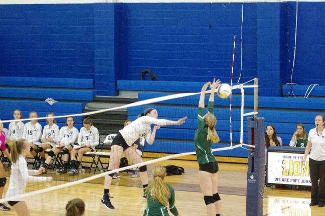 Montville tops Pope John in volleyball Pope John's Grace Parker (9) blasts the ball past a Montville opponent. Parker contributed one ace, fourteen kills, 0.5 blocks and ten digs.