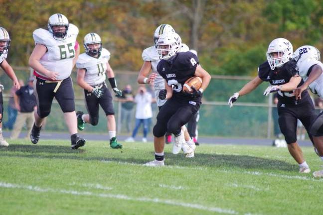 Wallkill Valley ball carrier Bobby McMillan is on the move in the third quarter. McMillan scored one rushing touchdown in the game.