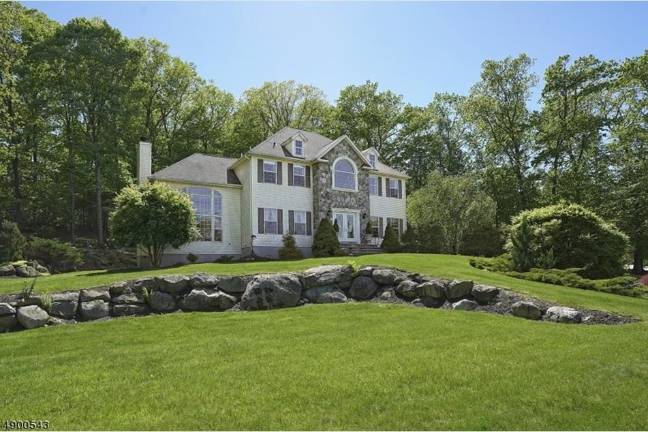Curb-appeal home with custom features and timeless floor plan Curb-appeal home with custom features and timeless floor plan