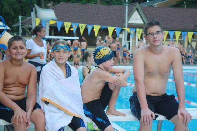 Lake Mohawk swimmers defeat West Milford PHOTOS BY ROSE SGARLATO L to R: Lake Mohawk Pool swimmers take a break at their final meet against West Milford: Blake Winberry, Matthew Flanz, Owen Englehardt and Eric Vincelette