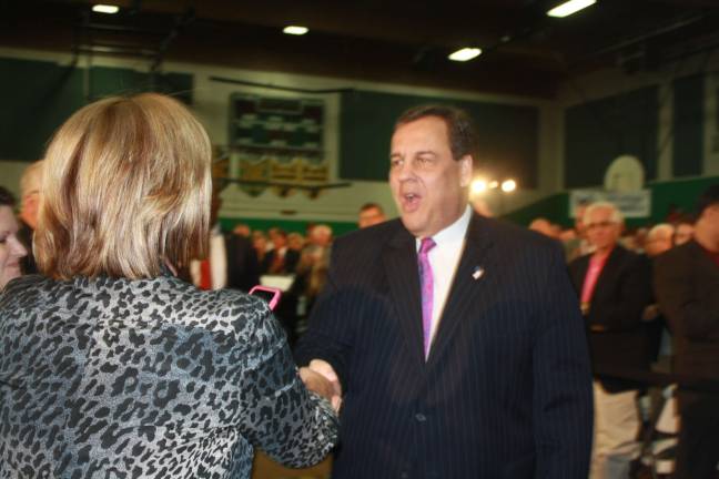 Gov. Christie greets a member of the audience during his 137th Town Hall, held last week in Sparta.