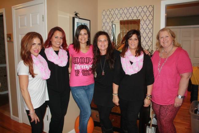Raising funds to combat breast cancer From left, Elissa Marcus of Beciga, Robyn Gueci of Thirty One Gifts, Nicole Chiong of NPower PT, Sissy Barg of Arbonne, Pattie Murphy of Arbonne and Marie Jurewicz of Touchstone Crystal.
