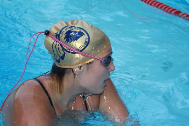 Swim team falls in home meet Emily Bettano, 16, takes a breather after winning the 50 meter breast stroke in 46.06 seconds. photos by rose sgarlato