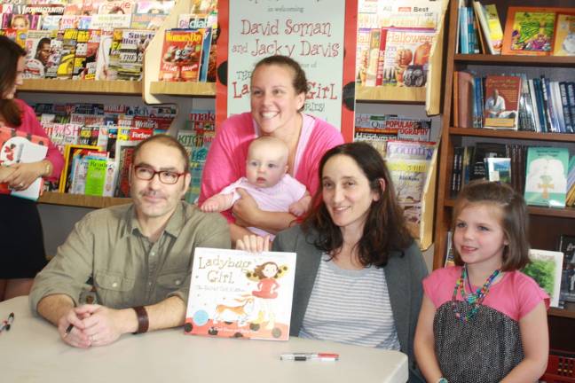 Ladybug Girl creators come to Sparta Books The Dennehy family gets a photo opportunity with Ladybug author Jacky Davis and illustrator David Soman.