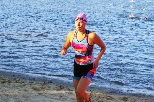 Another big triathlon for Pass it Along Fifty year old Michelle Dion of Wayne, N.J. finished in 117th place overall with a time of 1:35:04.32. Dion also finished in 4th place in the female 50-54 age category.