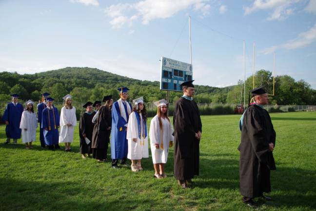 Sparta class of '15 graduates Soon-to-be graduates and faculty await the start of the graduation ceremony.
