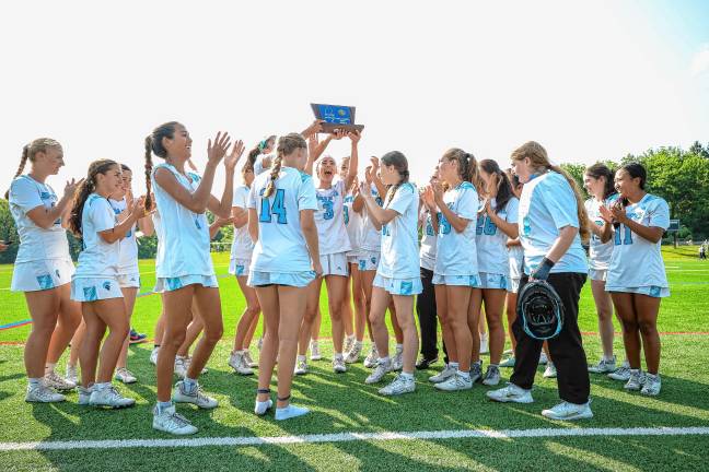 Photos: Spartans in Group 2 final The Sparta High School girls lacrosse team poses with the trophy after defeating Mendham, 8-4, in the NJSIAA North Jersey, Group 2 championship game Tuesday, June 10. The team will face Allentown there in the Group 2 final Friday, June 13. (Photos by Lauren Clark)