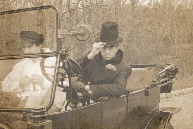 Students photograph classic car in antiquing project Students photograph classic car in antiquing project