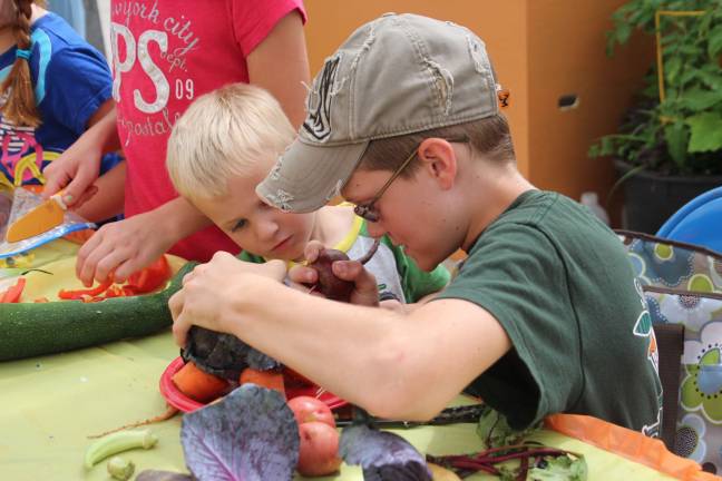A day at the fair Vegetable sculpture-Ethan and Reiss Little of Wantage make an elephant.