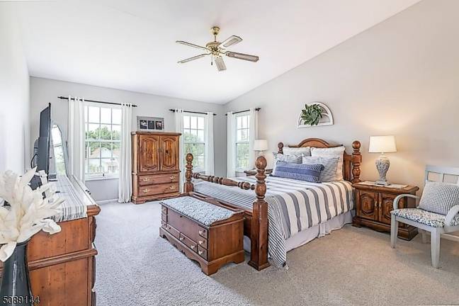 Home with classic beauty is nestled in a mature landscape Home with classic beauty is nestled in a mature landscape