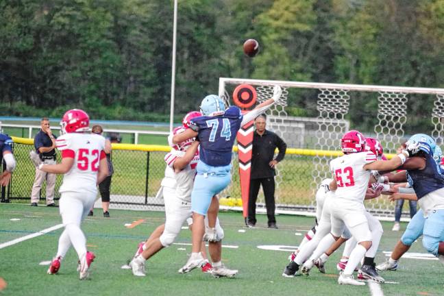 Vernon shuts out Dover <b>FB2 The ball is batted away by Sparta defensive tackle Ryder Chlodnicki (74) resulting in an incomplete pass by Lakeland in the first half.</b>