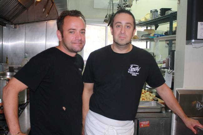 Andre's Restaurant settling in on Seneca Lake Executive Chef and Owner Andre de Waal with Chef de Cuisine Jeff Galan.