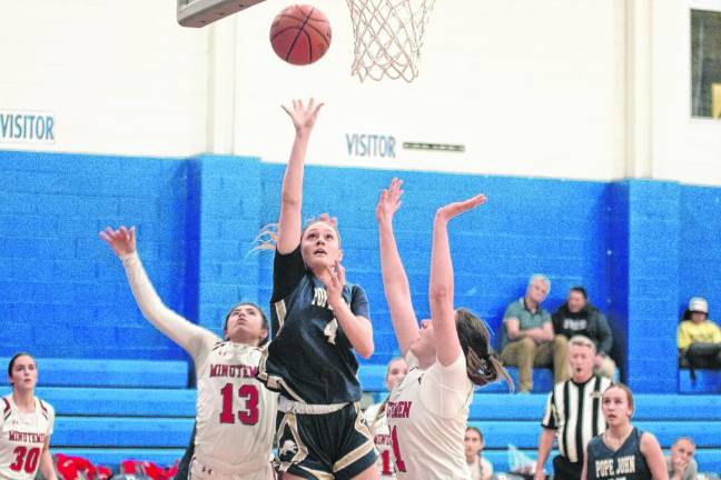 Pope John's Addison Platt releases the ball during the game against Newark Academy at home Thursday, Feb. 29. The Lions won, 56-31, in the semifinal round of the NJSIAA North Jersey, Non-Public A Tournament. (Photo by George Leroy Hunter)