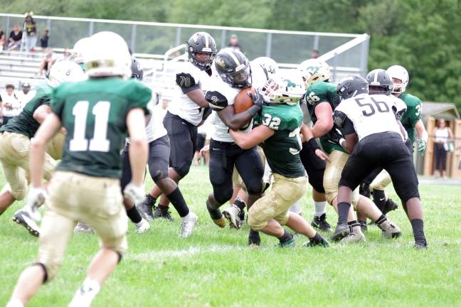 Hudson Catholic ball carrier Hasan Dominick smashes into Sussex Tech defender Danton Hall at the goal line late in the second quarter. Dominick was able to get past Hall and make it into the end zone for a touchdown.