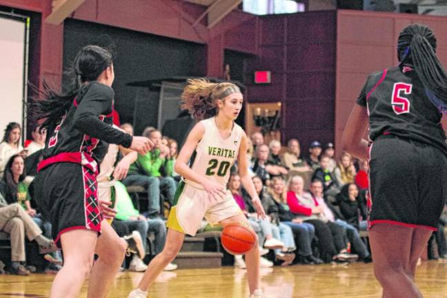 Veritas forward Madelyn Seifert scores 12 points in the Dec. 21 game against Harmony Christian of New York. Veritas won, 73-29. (Photo by George Leroy Hunter)