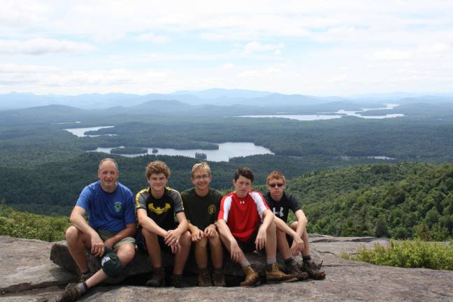 Sparta scouts take canoe journey On the mountaintop. From left, Gene Schwarzrock, Thomas Schwarzrock, John Bollard, Robert Hartranft, Jay Suter
