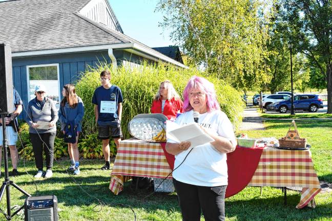 Photos: Celebrate a Life 5K Walk <b>Lorri Opitz, a longtime counselor at the Joseph T. Quinlan Bereavement Center, speaks at the event.</b>