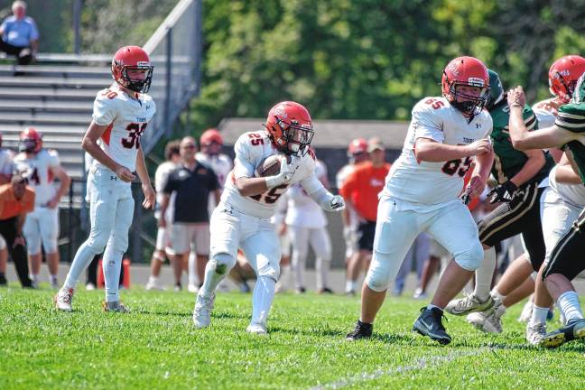 High Point tops Kittatinny, 14-7 <b>Hackettstown ball carrier Anthony Best follows his blocker Zach Jenkins (65). Best scored one touchdown.</b>