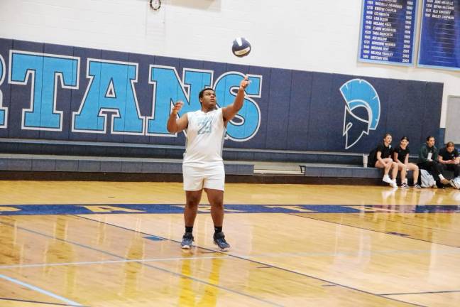 Sparta's Seth Gary in the midst of a serve. He is credited with one block and one service point.