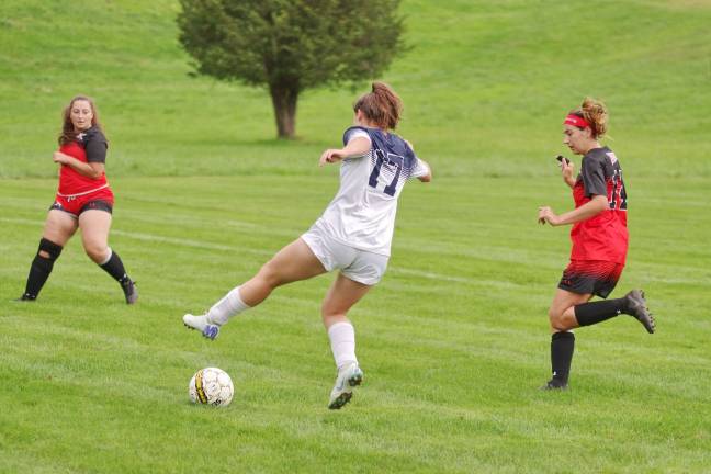 SCCC drubs Northampton in women's soccer Sussex Skylander Siera Simon leaps above the ball in the first half. Simon is a graduate of Hopatcong High School in Sussex County, N.J. Photos by George Leroy Hunter