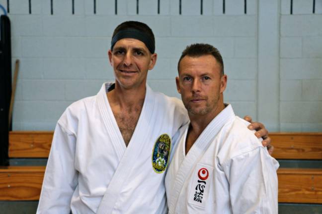 East West Karate promotes student to advanced rank Adam Kutner stands proudly with Sensei Scott Klinger after his promotion to Ni Dan.