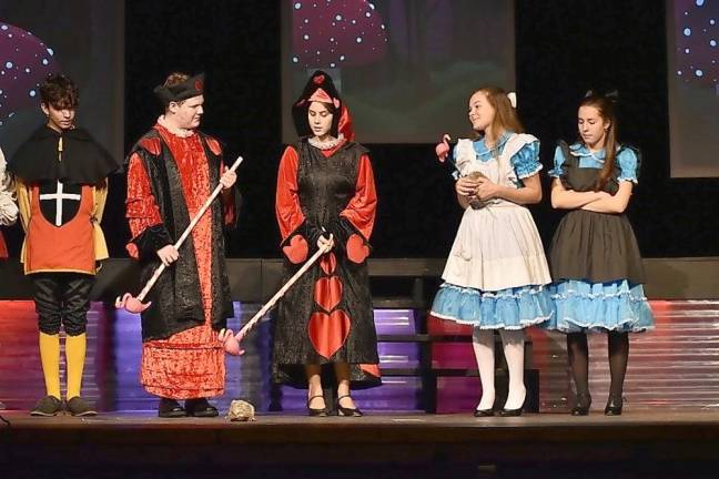 The Queen of Hearts (Marley Balkau) and the King of Hearts (Clayton Doyle) are about to play a game of croquet as only the characters of Wonderland would! (Photo provided)