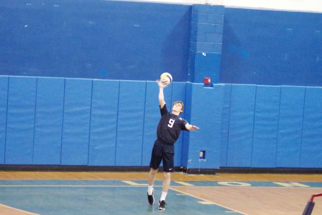 Pope John's strikes down Dover in volleyball Pope John's John Geba handles the ball during a serve. Geba contributed 1 ace, 3 kills, 4 blocks and 5 digs.