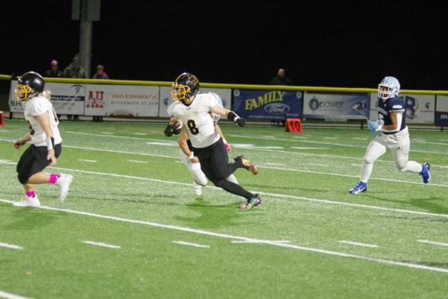 West Milford ball carrier Chase Tyburczy is on the run in the first half of the game against Sparta.