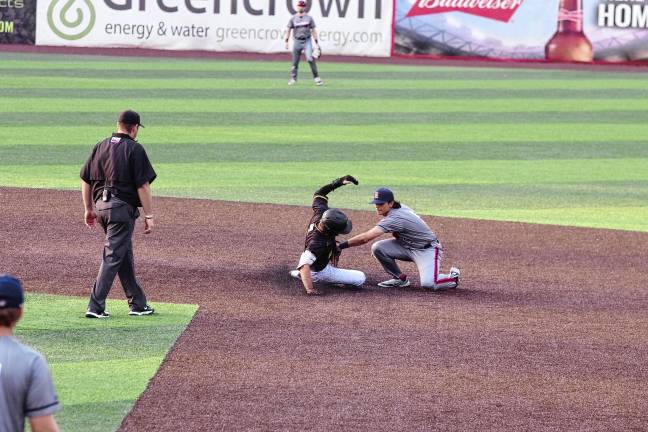 Miners lead division <b>Miners runner Hunter D'Amato is tagged out at second base by Rox infielder J.R. DiSarcina in the second inning. </b>