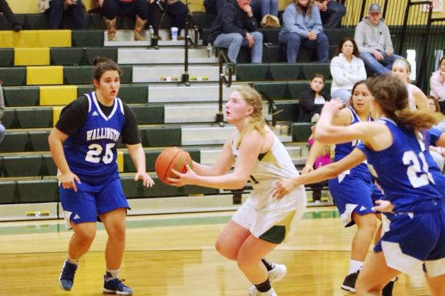 Sussex Tech's Riley Feichtl moves the ball forward in the fourth quarter. Feichtl scored 15 points and grabbed 11 rebounds.