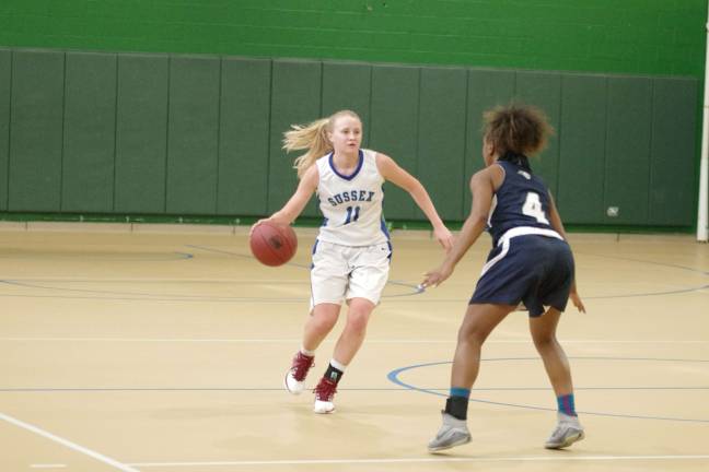 Camden beats Sussex in girls hoops Sussex County's Knakkagaard dribbles the ball while covered by Camden's Mya Lewis.