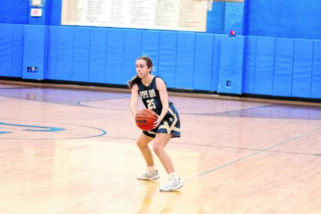 Pope John's Marisa Captoni made two assists and grabbed one rebound. (Photo by George Leroy Hunter)