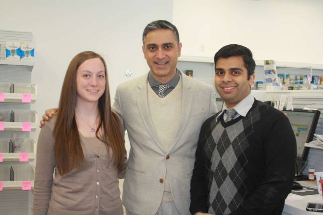 Pharmacy opens with community in mind Pharmacy technician Brianna Leahy with owners and pharmacists Mickey Singh and Prahar Parikh.