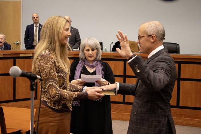 SC1 Neill Clark is sworn in as mayor of Sparta at the Township Council’s reorganization meeting Thursday, Jan. 4. (Photos by Dave Smith)