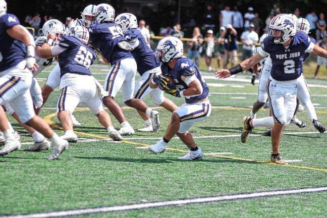 Football roundup: High Point beats Jefferson <b>Pope John running back Luke Gialanella takes the ball from quarterback Luke Irwin (2) during a handoff. (Photo by George Leroy Hunter)</b>
