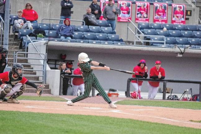 Sussex Tech batter Hunter Lowery hits the ball in the first inning. He scored one run.