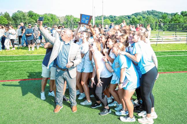 Photos: Spartans in Group 2 final The Spartans pose with their trophy.