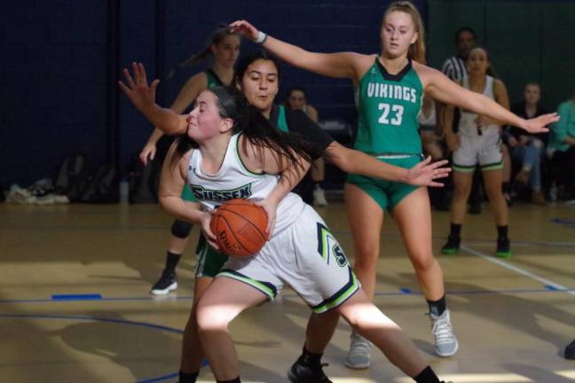 Sussex County's Madison Mailloux moves forward with the ball in the fourth quarter.