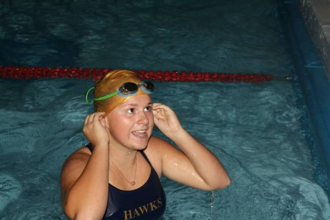 Swim team falls in home meet Zoe Abrams, 16, finishes in her last race of the meet.
