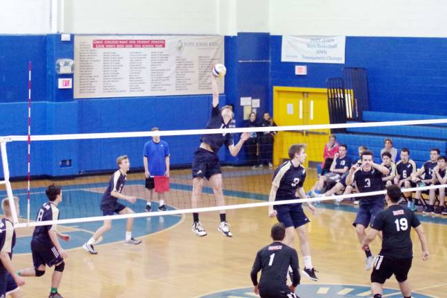 Pope John's strikes down Dover in volleyball Pope John's Andrew Ward reaches high to strike the ball. Ward contributed 1 ace, 22 kills, 3 blocks and 8 digs.