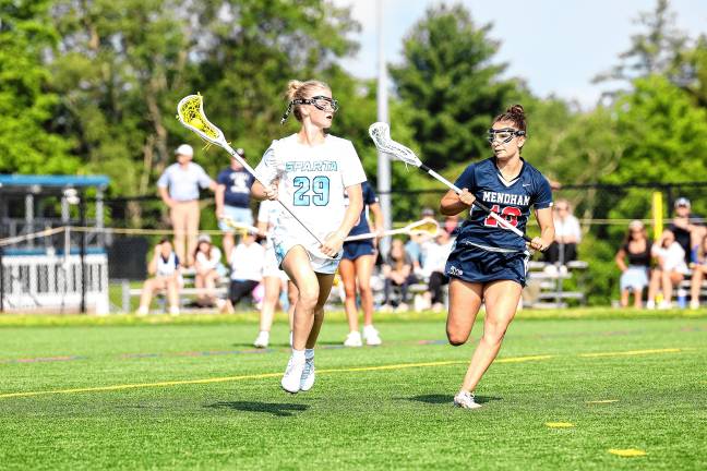 Photos: Spartans in Group 2 final Sparta’s Grace Johnson outruns Mendham’s Cristiana Laracca.