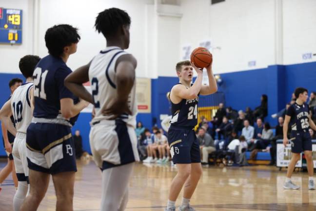 Pope John’s Tyler Houser shoots a free throw.