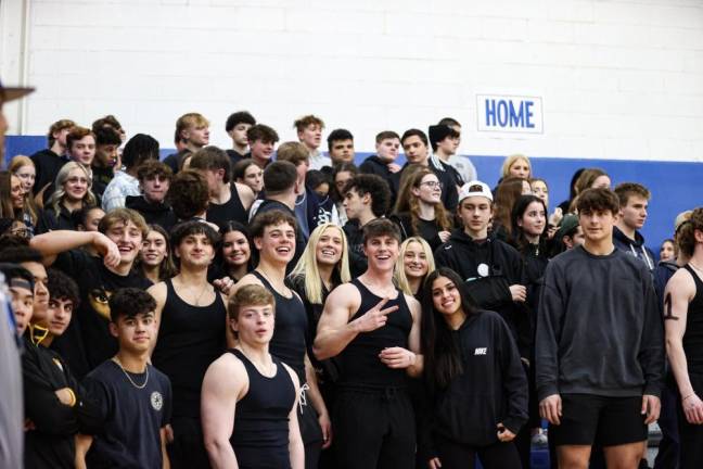 Pope John students watch the game.