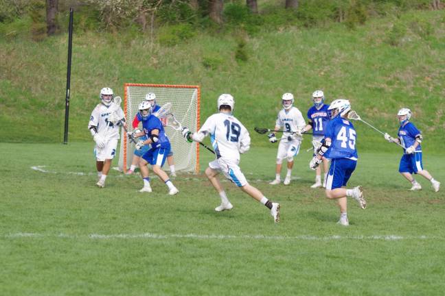 Spartans top Blue devils in boys lacrosse Sparta's Beck Gozdenovich (19) moves the ball towards the Westfield goal post. Gozdenovich picked up one ground ball.