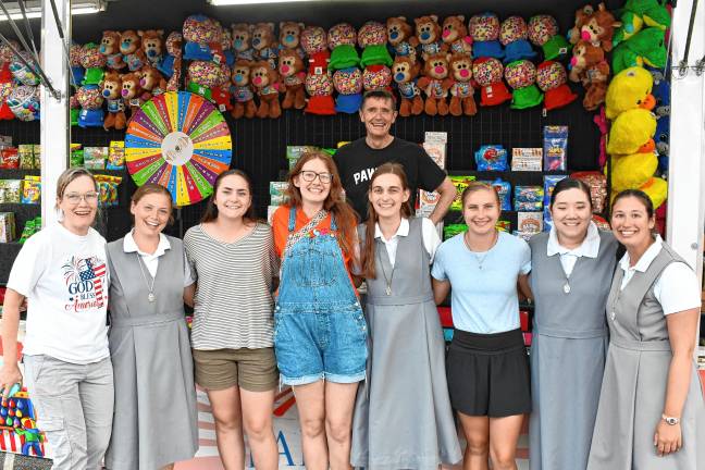 Photos: Our Lady of the Lake carnival in Sparta Sisters and missionaries of Camp Auxilium in Newton.