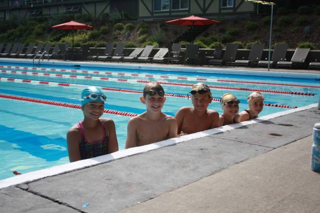 Swimmers pictured left to right are Yasmeen Caswell, Will Englehardt, Michael O'Krepky, Molly Englehardt and Ella Duphiney.