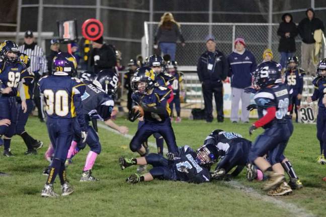 Milk Bowl makes a difference All-day youth football event brings community together Sparta Blue Pony and Vernon Pony battle on the field. Sparta won the game by the score of 20-7.