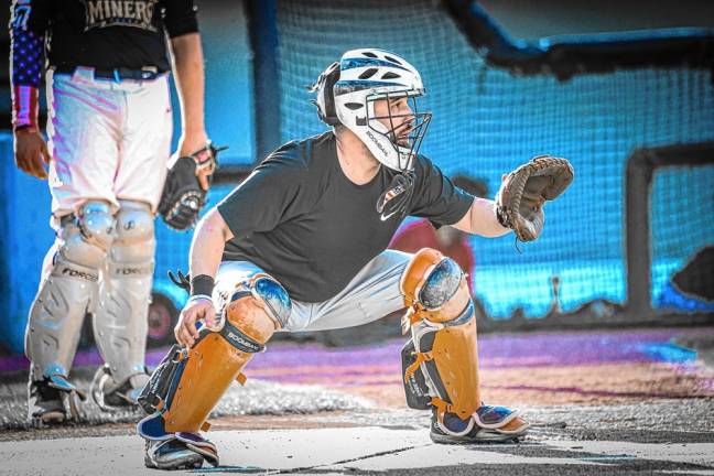 Louis Rios of Milford Pa., tries out for catcher.